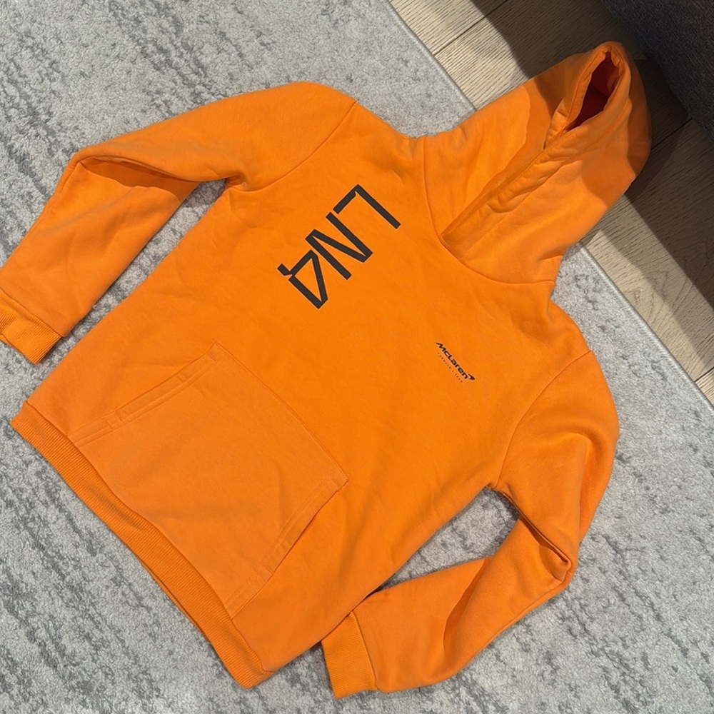 Orange Hoodie with Black Graphic